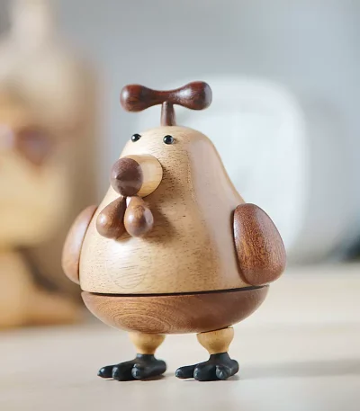 A charming wooden music box featuring a chicken design