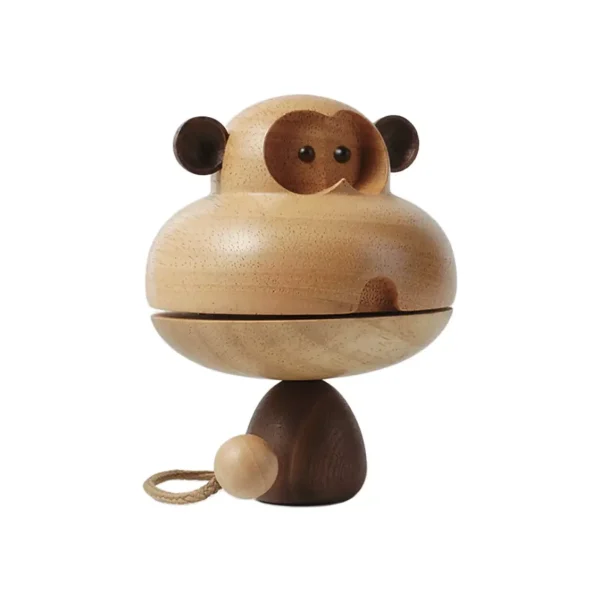 A playful wooden music box featuring a monkey design