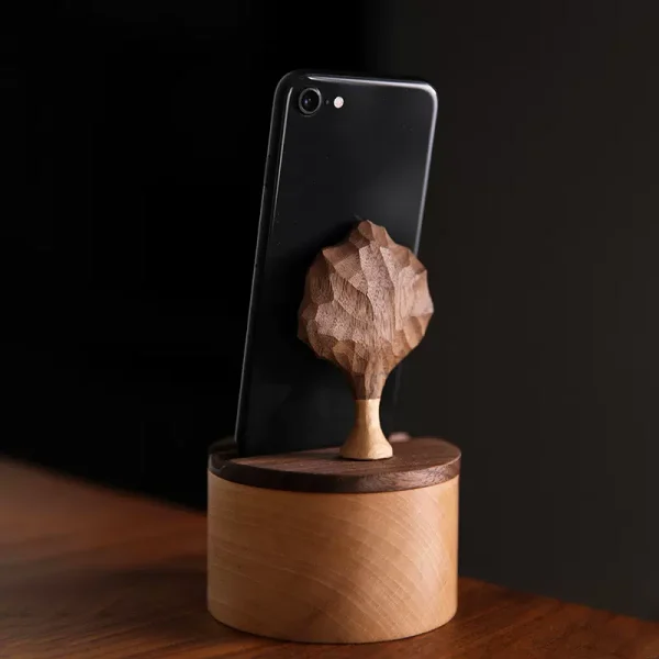 Wooden phone stand box with an apple tree carving design