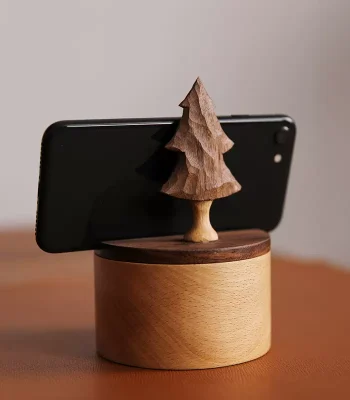 A wooden phone stand box with a cedar tree carving design