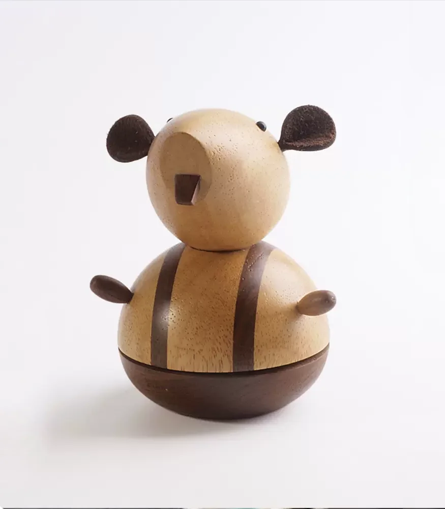 Charming wooden mouse music box showcasing intricate front details and cute facial features