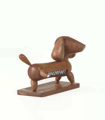 This is a wooden temporary car parking card featuring a Dachshund design, perfect for marking your parking spot