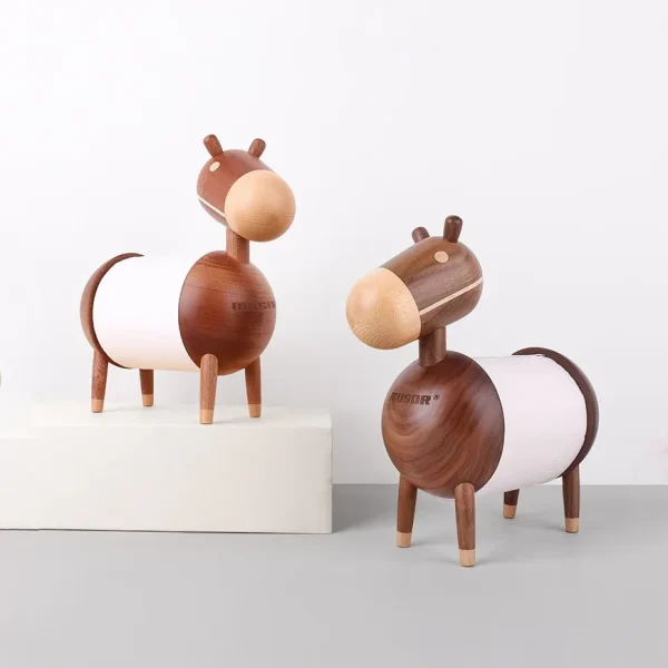 A charming wooden tissue holder featuring two donkey designs