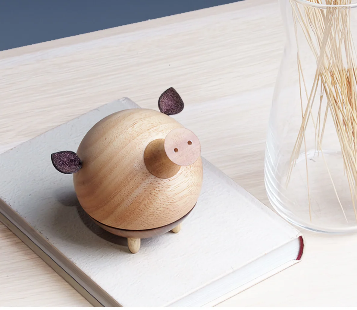 A stylish wooden pig music box in ins style