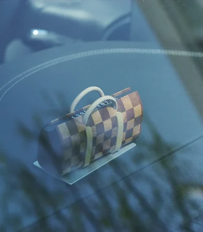 A wood-finished temporary car parking card with a decorative Mini LV Bag design, ideal for managing your parking spot