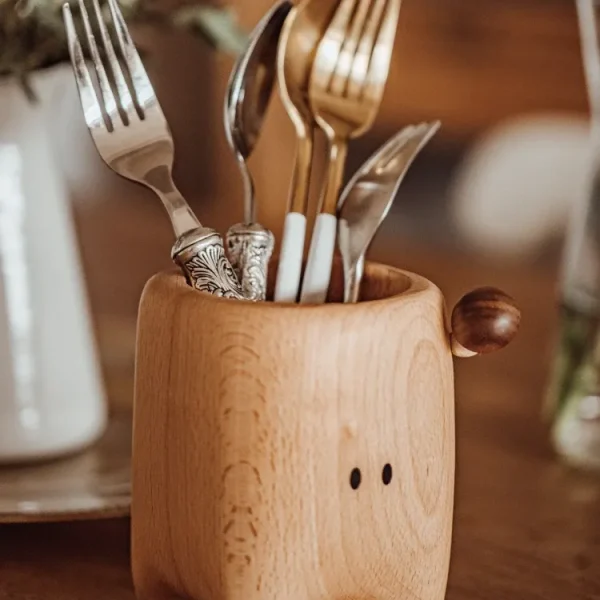 This mushroom-shaped wooden storage box offers a charming and functional solution for organizing small items, making it a delightful addition to any room