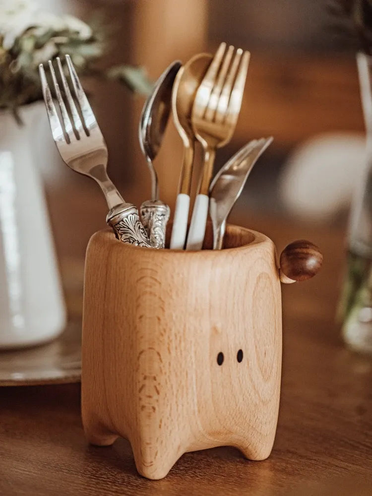 This mushroom-shaped wooden storage box offers a charming and functional solution for organizing small items, making it a delightful addition to any room