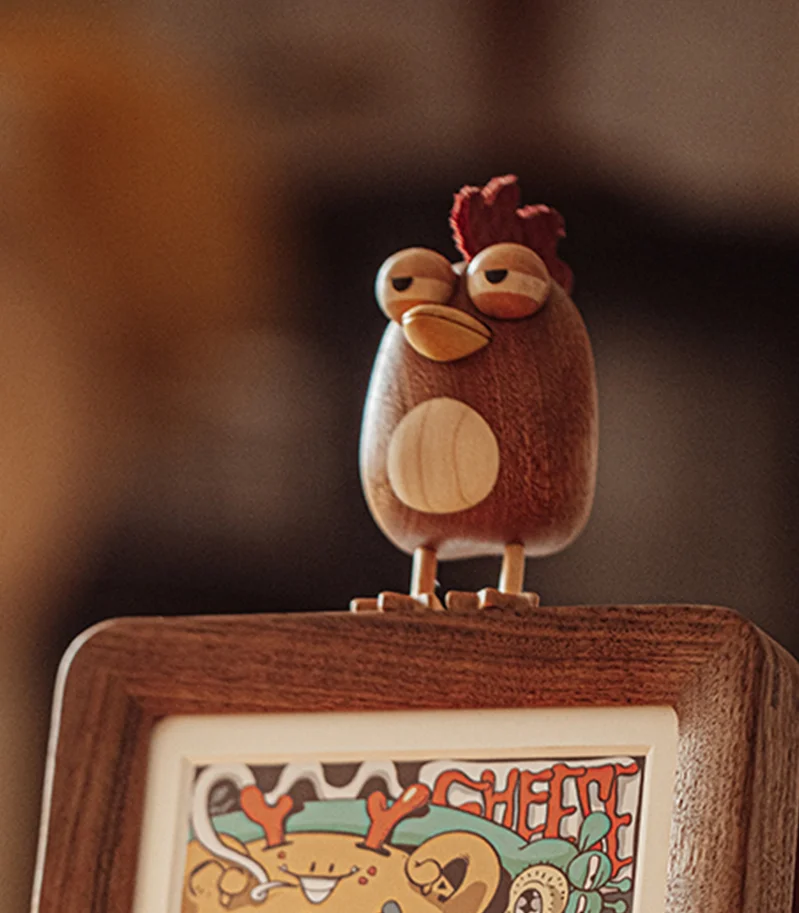 A charming handcrafted chicken-themed ornament designed