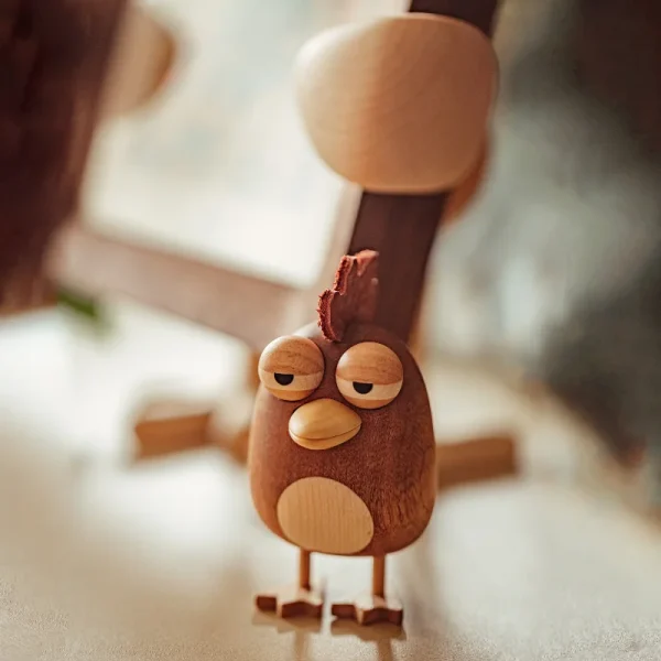 A charming handcrafted chicken-themed ornament designed