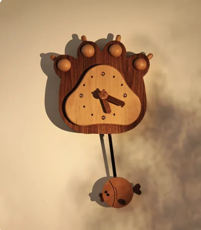 A beautifully crafted bear paw wooden wall clock, blending nature-inspired design with functionality