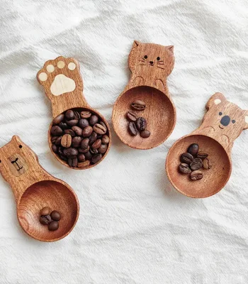 A playful cute cat-themed coffee wooden measuring spoon, ideal for coffee lovers who enjoy a little whimsy with their routine