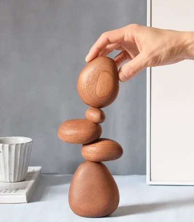 Handcrafted wooden stones for balancing, designed to enhance relaxation and mindfulness