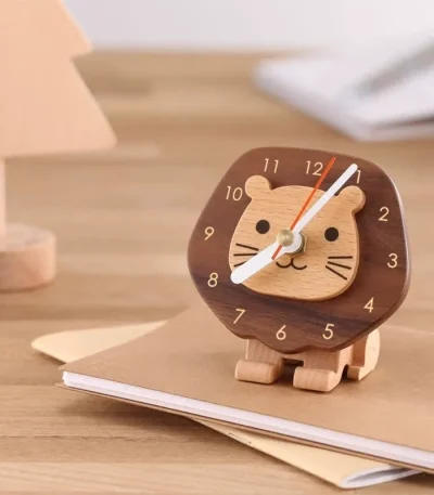 A delightful wooden clock with a playful little lion design, perfect for brightening up any bedroom with a touch of fun