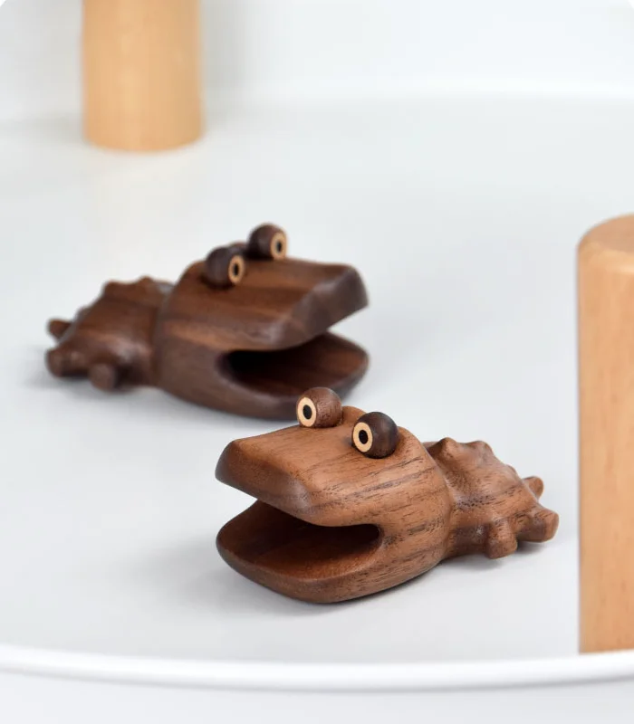 This unique walnut wood crocodile magnet is both decorative and functional, ideal for home or office decor