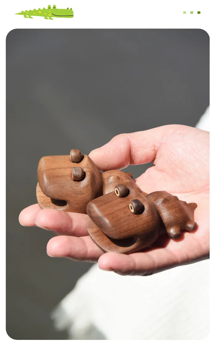 A beautifully crafted wooden crocodile magnet with a unique design and hidden magnets