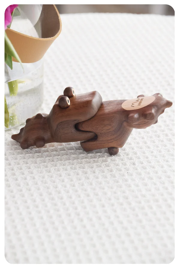 Handcrafted crocodile-shaped magnet features a hidden magnetic structure, ideal for home and office decor