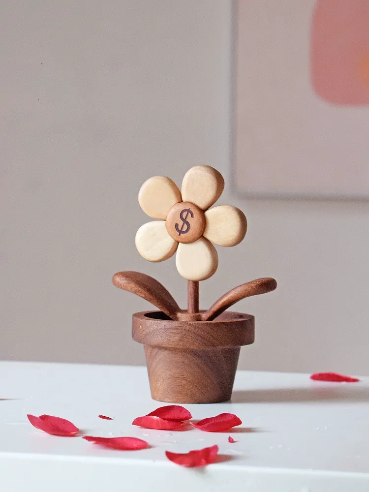 Handcrafted wooden flower with spinning petals for luck on your desk