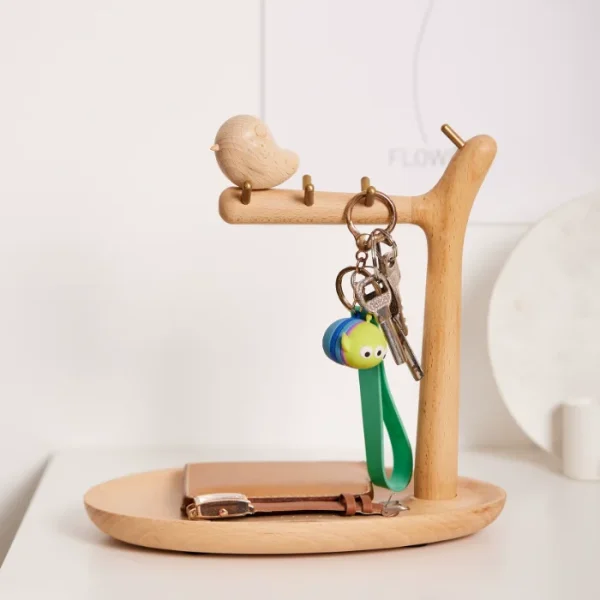 A wooden tit-shaped key holder with a storage tray, perfect for tabletops