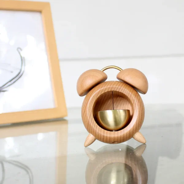 Wooden doorbell shaped like an alarm clock