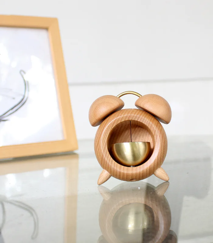 Wooden doorbell shaped like an alarm clock