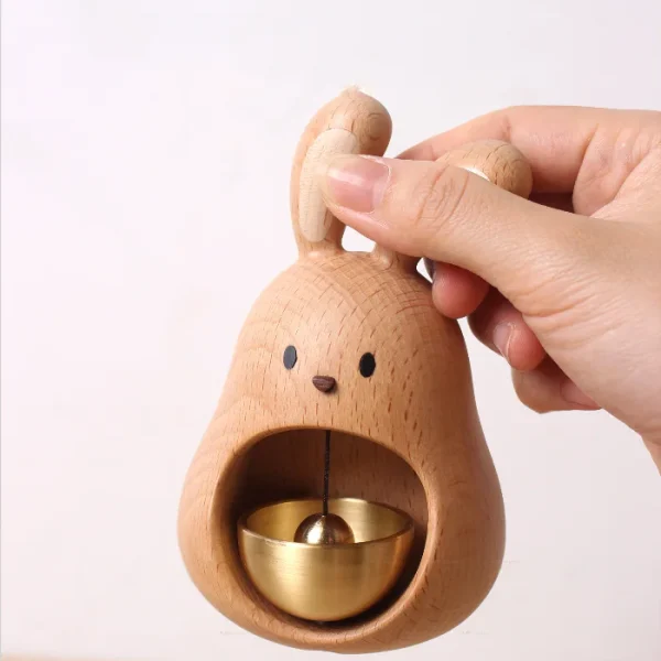 Wooden doorbell featuring a big mouth rabbit design