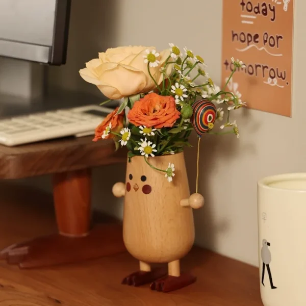 Unique wooden pen holder that doubles as a vase, with a charming design