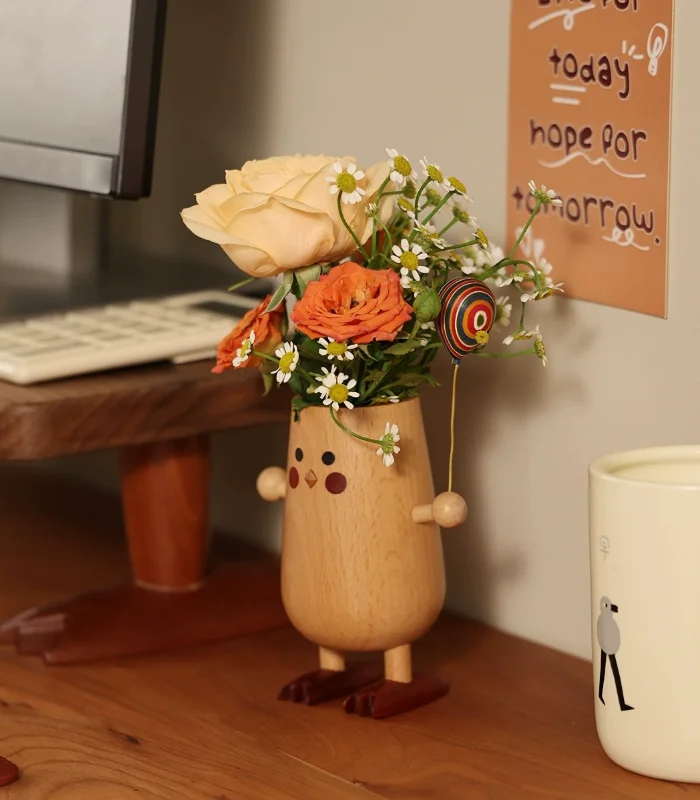 Unique wooden pen holder that doubles as a vase, with a charming design