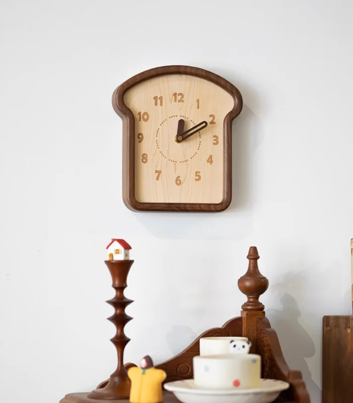 Cute wooden toast clock with a minimalist bread design for home decoration