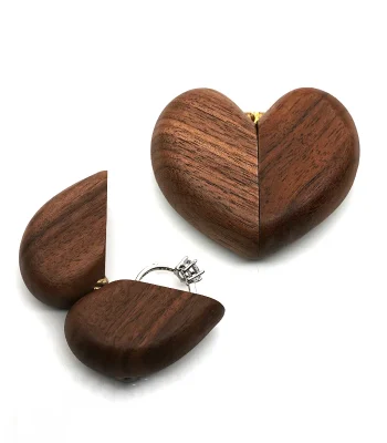 Elegant wooden ring box in a heart shape, perfect for proposals