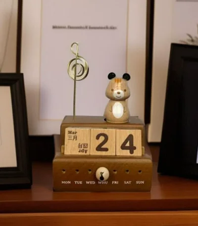 Wooden music box with a squirrel and block calendar, perfect as a birthday gift