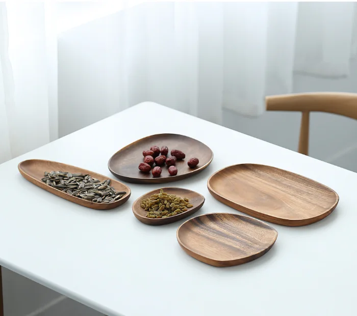 Natural wooden serving plate with a unique shape for snacks and desserts