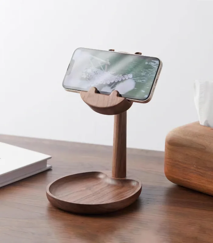 Hippo-shaped wooden phone stand with a tray for organizing small items