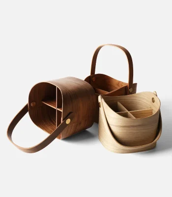 A sleek wooden basket for storing household items like beer bottles