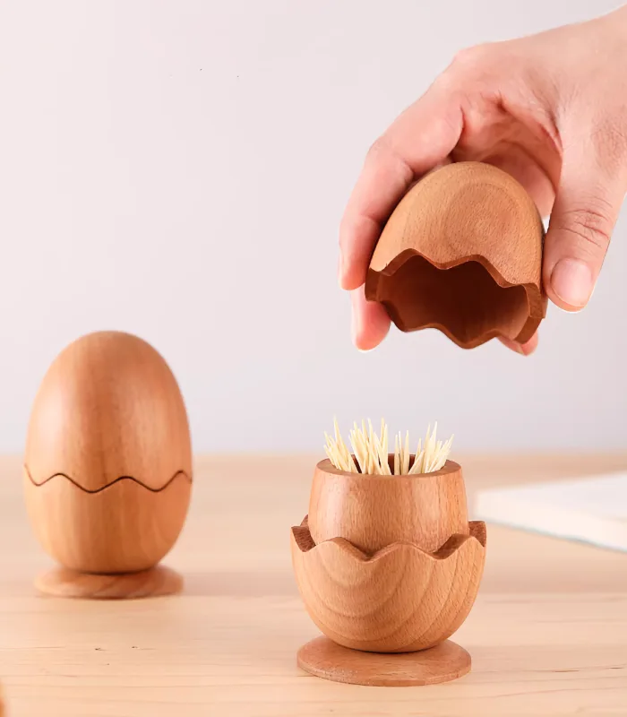 Cute wooden toothpick holder in an egg shape, perfect for home decor