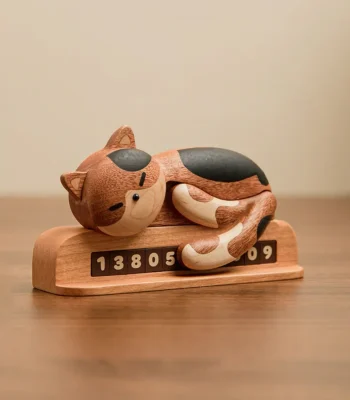 Adorable wooden parking plate featuring a sleeping cat design