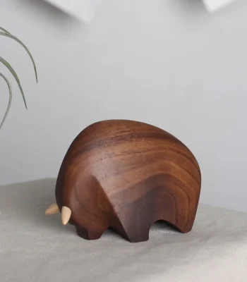 Minimalist wooden bull sculpture, perfect for adding a natural accent to home decor