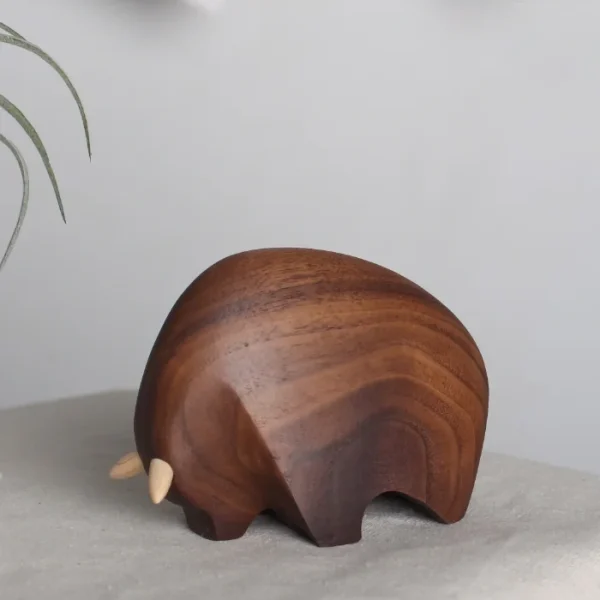 Minimalist wooden bull sculpture, perfect for adding a natural accent to home decor