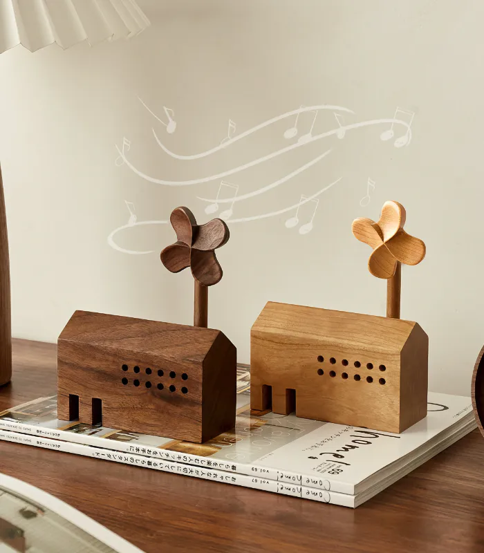 Wooden music box with a pinwheel design, combines music and aromatherapy for relaxation