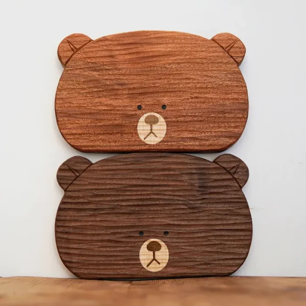 Handcrafted wooden plate set in an adorable bear shape, perfect for serving snacks or desserts