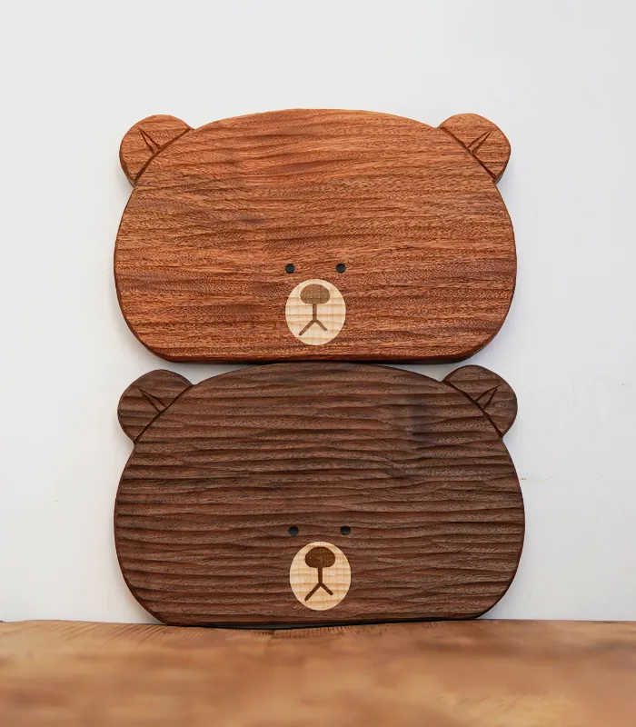 Handcrafted wooden plate set in an adorable bear shape, perfect for serving snacks or desserts