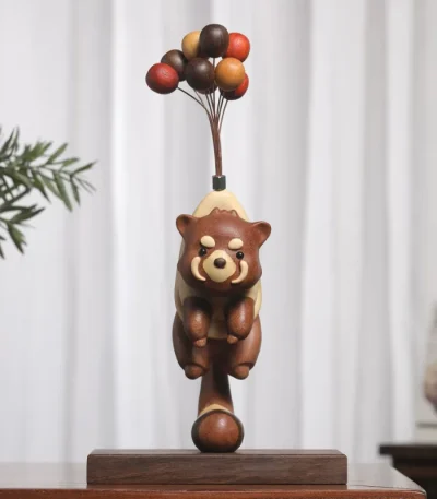 Handcrafted wooden raccoon figurine with a whimsical flying pose, perfect for your home decor