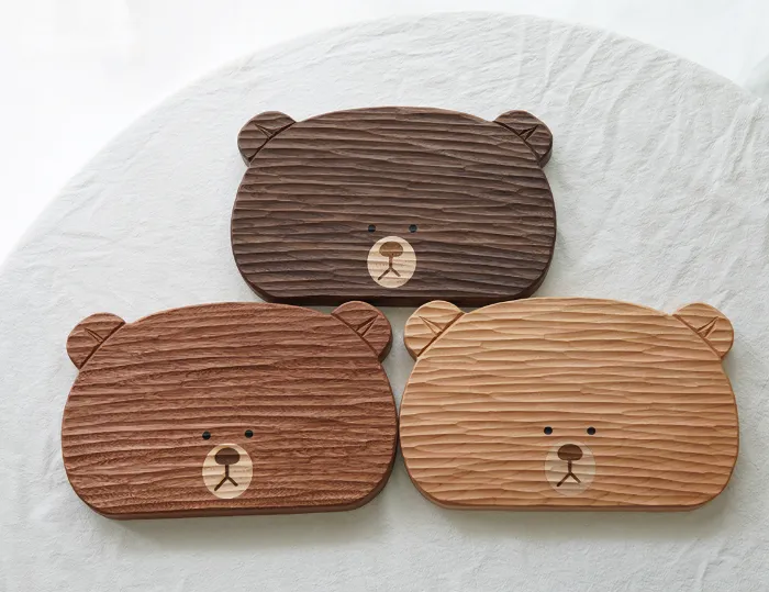 Durable and cute wooden snack board shaped like a bear, a perfect combination of decor and utility