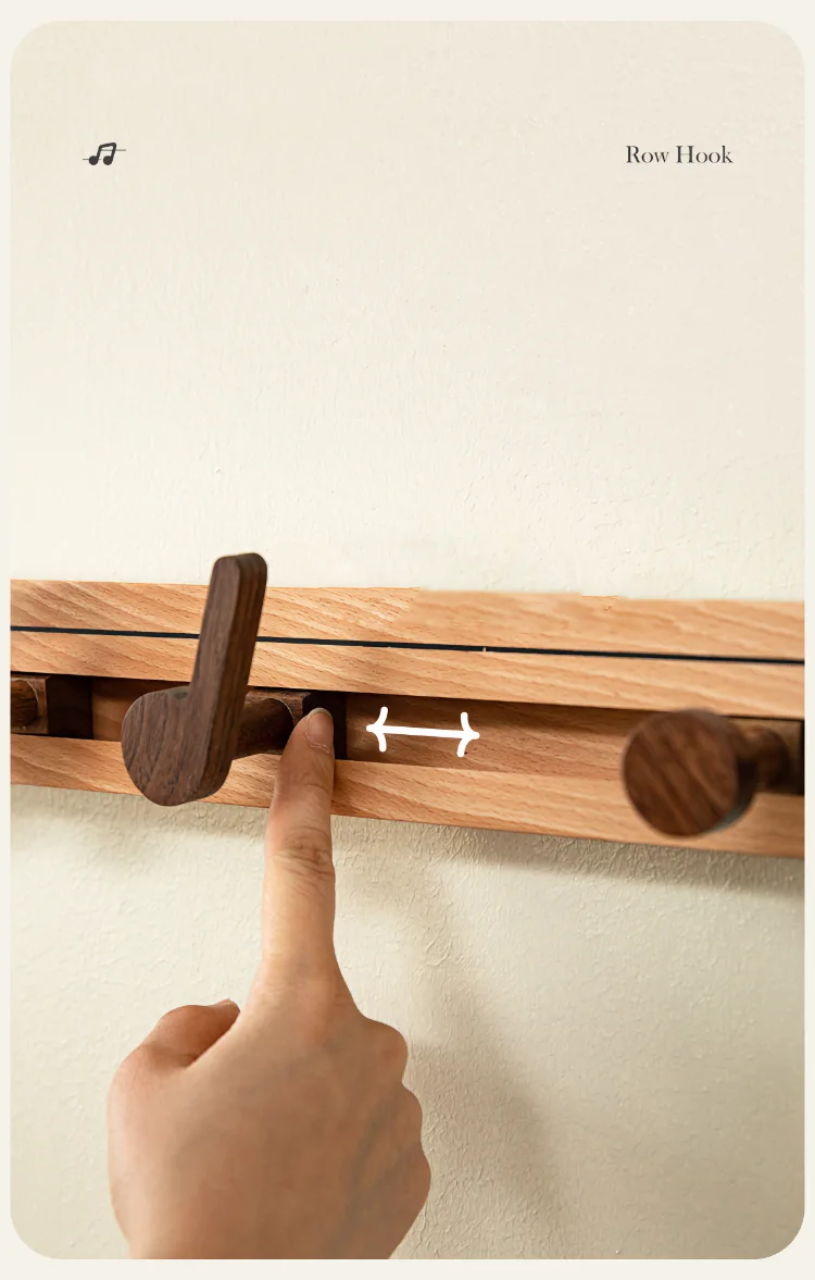 Elegant wall-mounted hooks shaped like music notes, blending practicality with artistic design