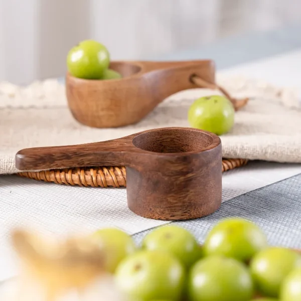 Artisan-made mini wood cup paired with a matching spoon, ideal for desserts or condiments