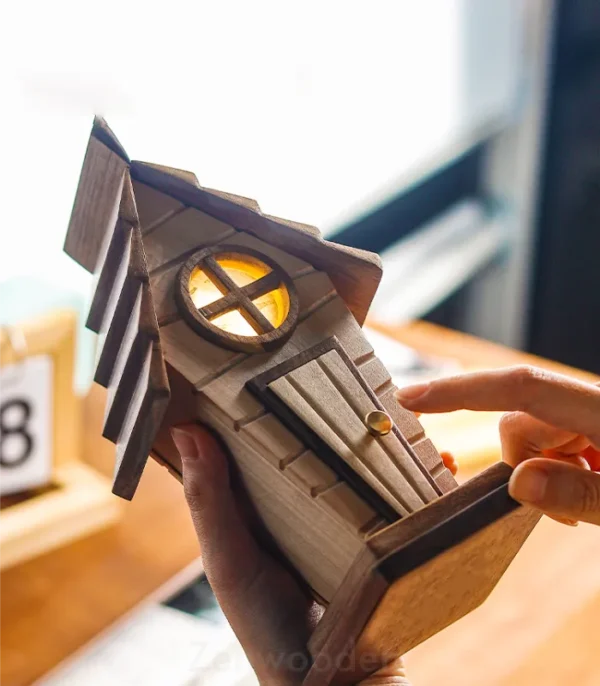 Wooden Pig House night light creating cozy ambient lighting on a bedside table.
